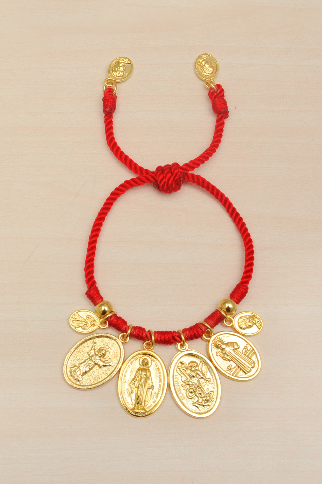 Pulsera de siete nudos con dije