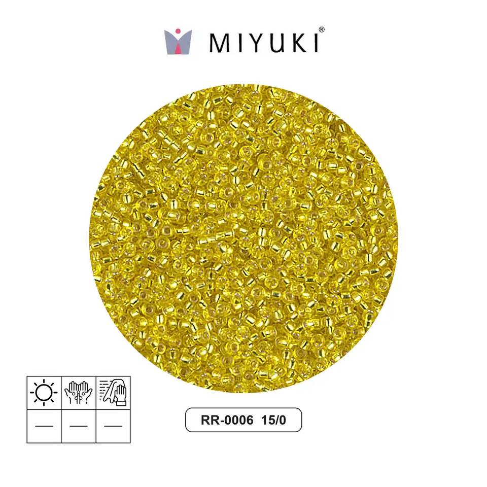 Mostacilla Miyuki rocalla 15/0 RR0006 plateado forrado amarillo x 250g
